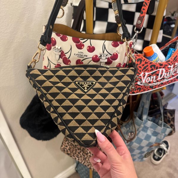 Black and gold Prada bag